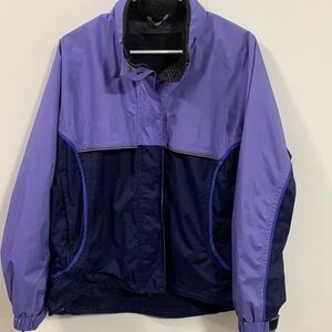 Women’s Moving Comfort jacket, purple and black. No size or material tags
